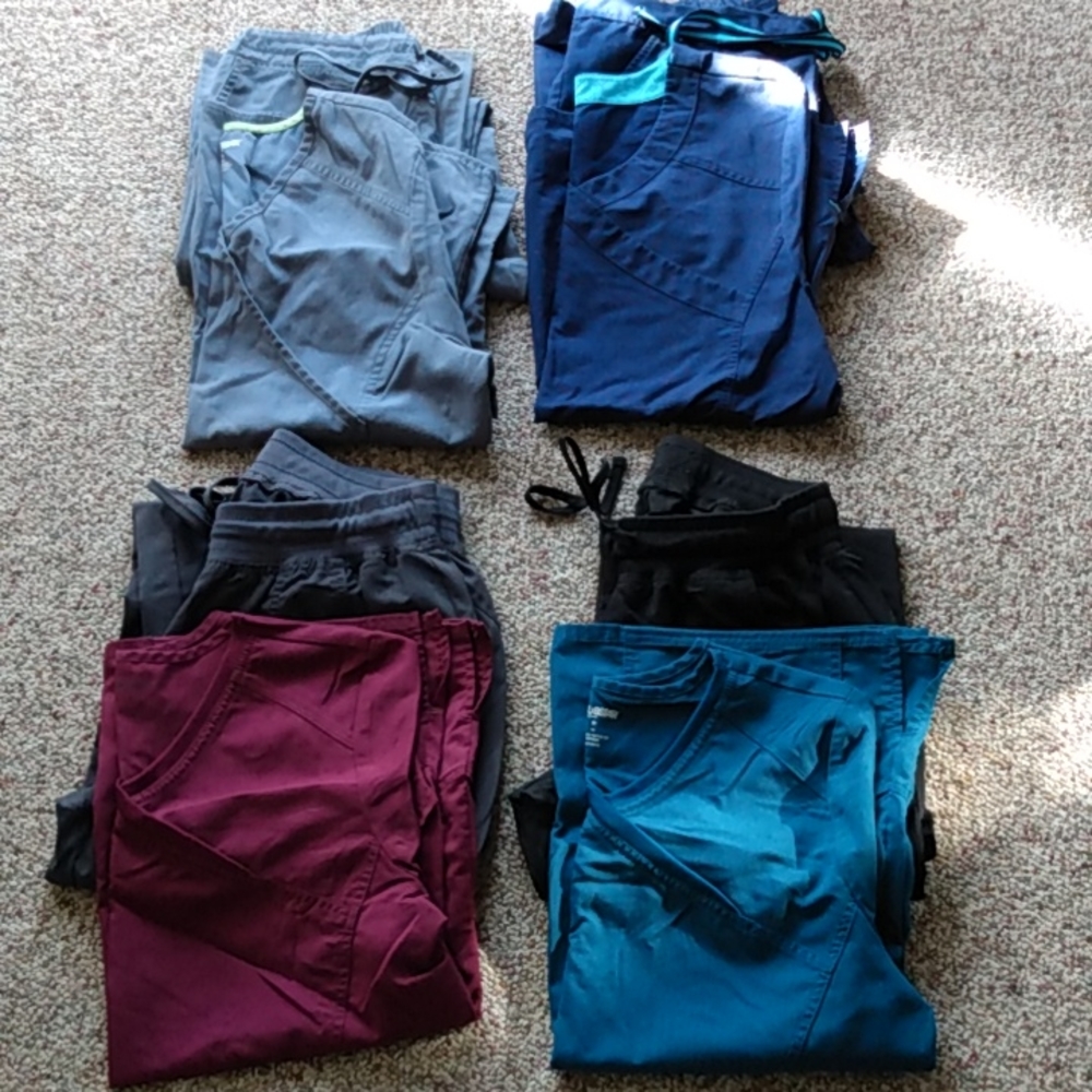 Scrub sets. 4 sets - 1 top & 1 bottom is set. Size Medium